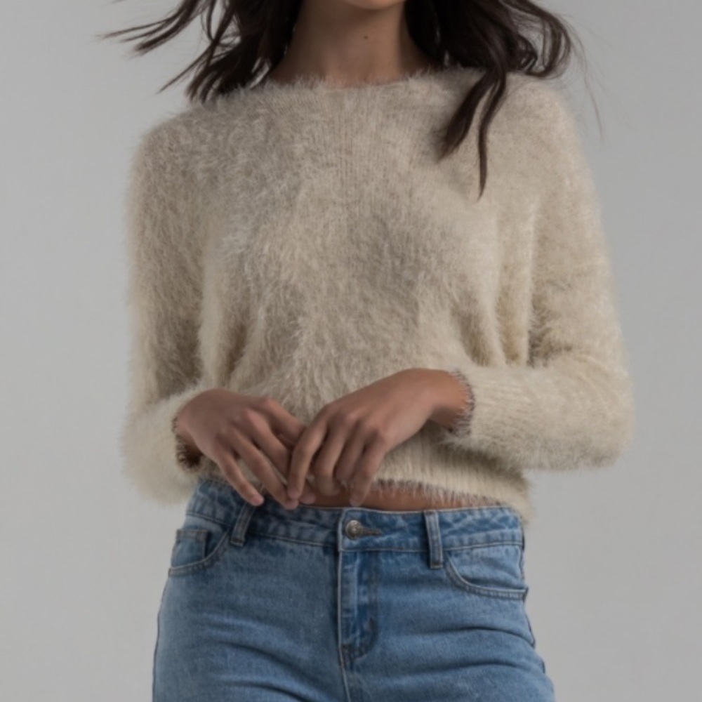 Beige fuzzy sweater and taupe pocket book